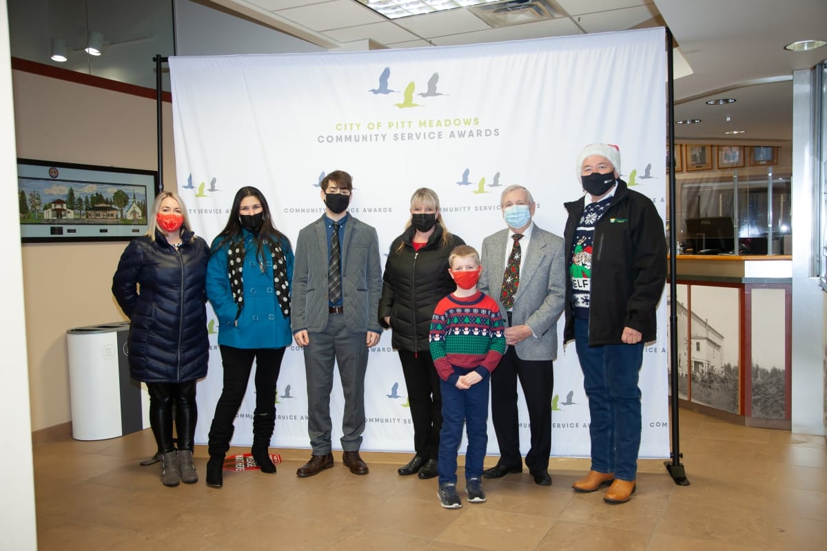 Pictured from left to right: Danielle Spraggs from the Community Service Awards Task Force; award recipients Thelma Rodriguez, Ali El Massri, Amy Shaw, Tristan Kennedy, John Barnes; Mayor Bill Dingwall