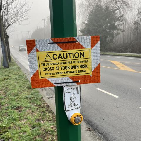 caution sign at hammond and wildwood crosswalk
